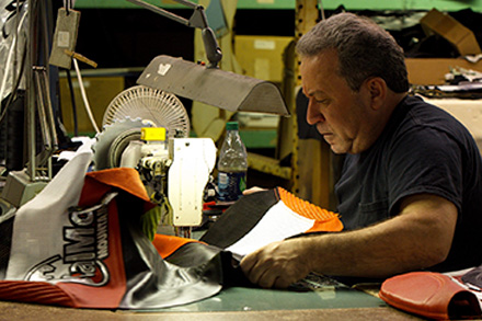 A Vanson racing suit being hand built in our Fall River shop